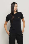 T-shirt paricollo in bielastico con logo oro lato cuore • Nero - Gaëlle Paris