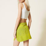 Minigonna in jeans sovratinto